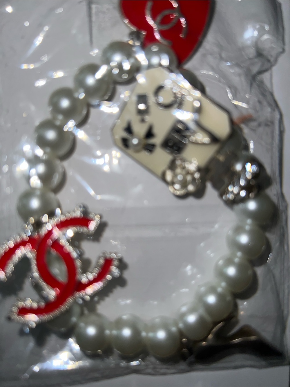 Pearl Beaded Bracelet with Red Logo Charm